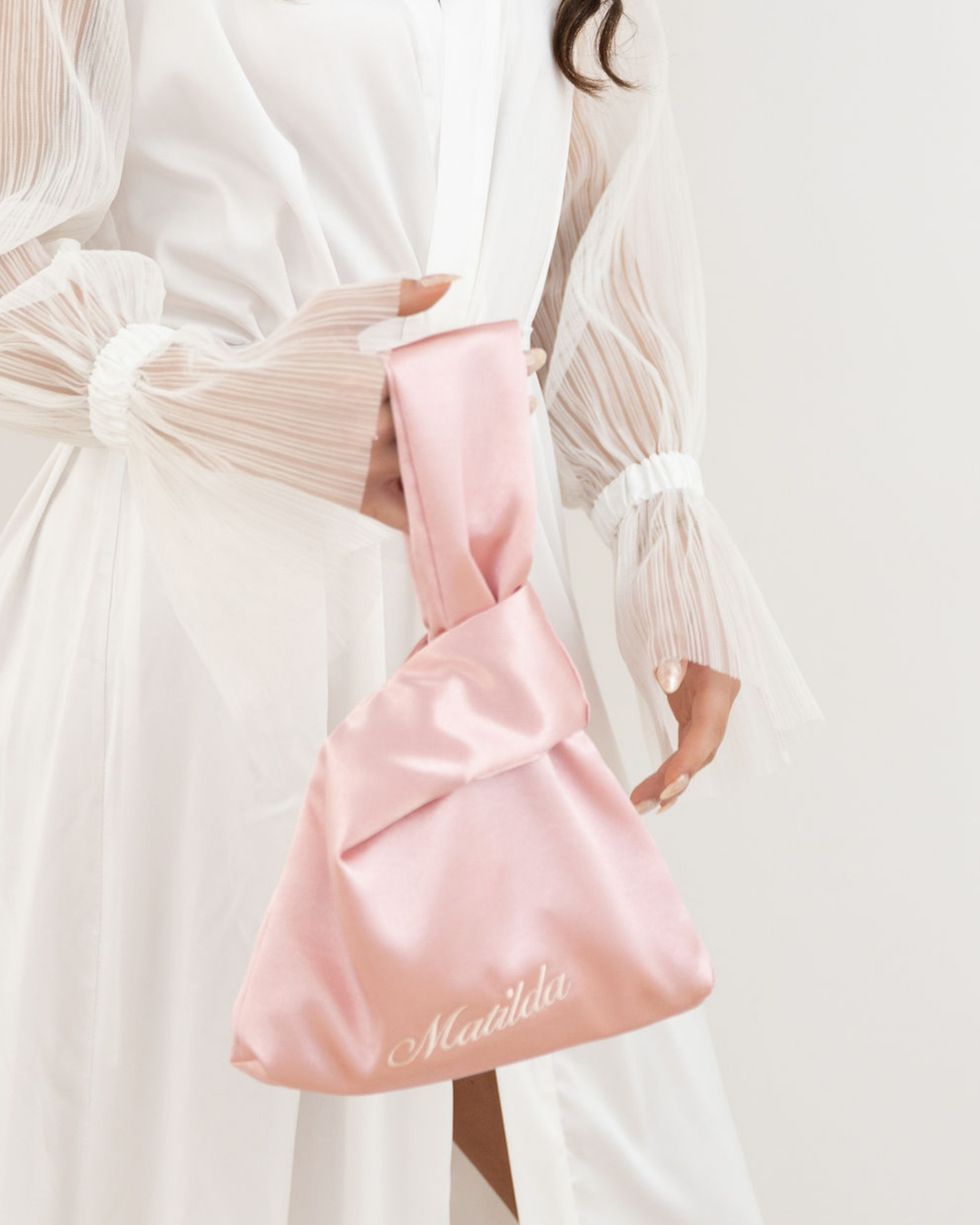 The Satin Knot Clutch