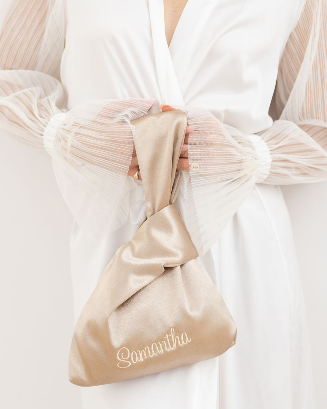 The Satin Knot Clutch