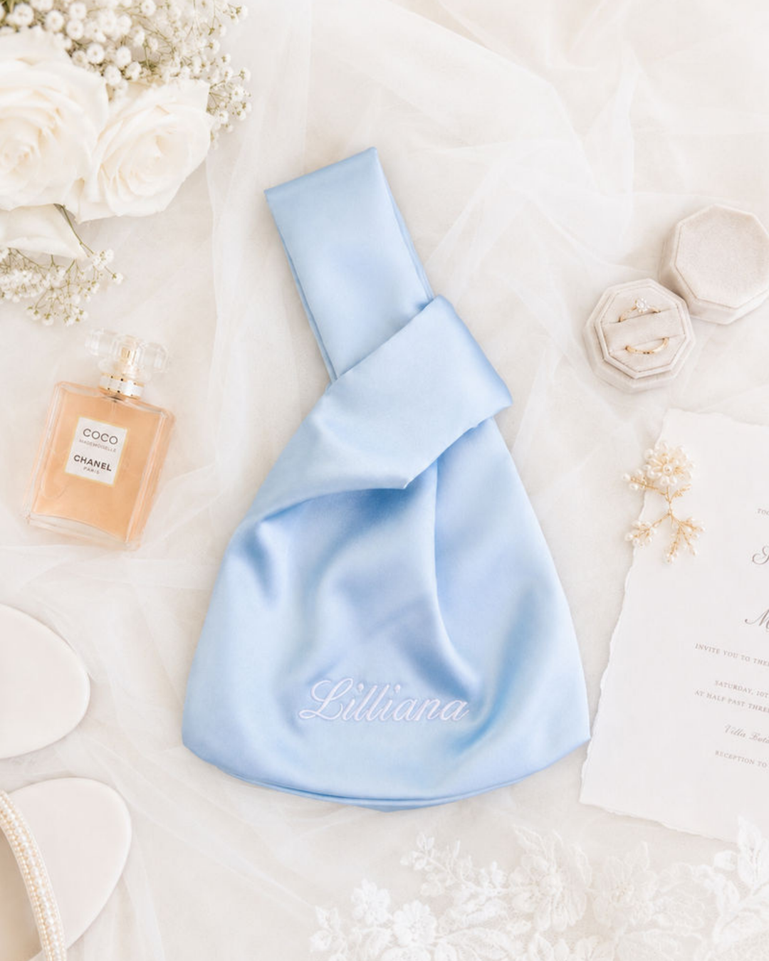 The Satin Knot Clutch