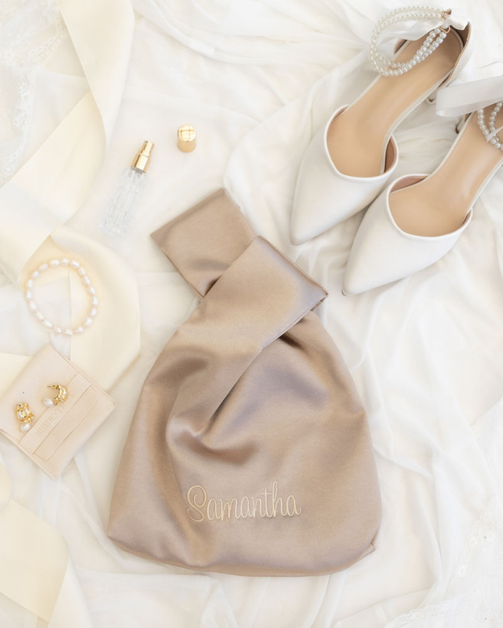 The Satin Knot Clutch